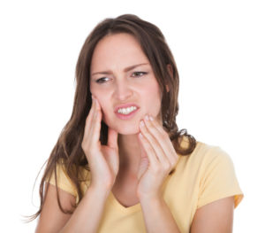 Young Woman Suffering From Toothache.